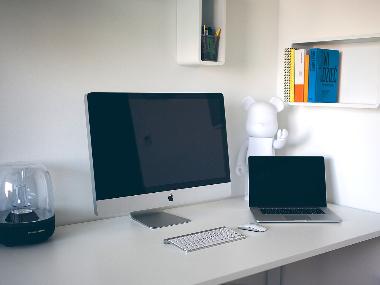 Office table with several computers connected to the internet