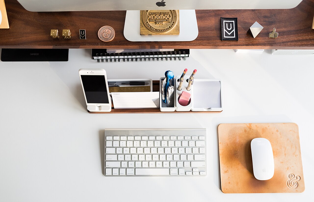 Overhead view of a minimal desktop workspace